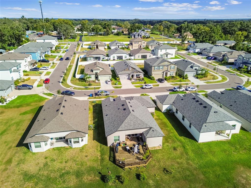 1039 Davis Heather Circle Seffner, FL 33584 - Photo 26 of 27 an aerial view of a swimming pool with outdoor seating