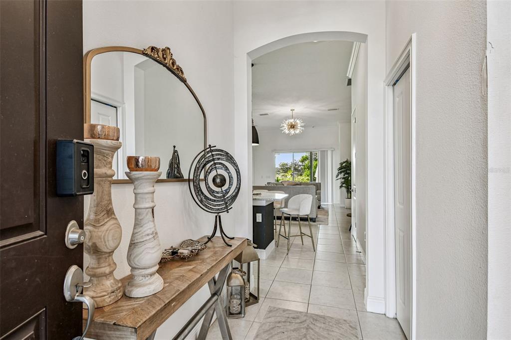 1039 Davis Heather Circle Seffner, FL 33584 - Photo 4 of 27 a view of dining room and wooden floor