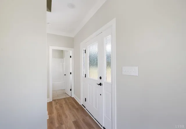 a view of a storage & utility room with a window