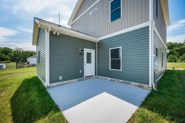a bathroom with a granite countertop sink mirror and vanity