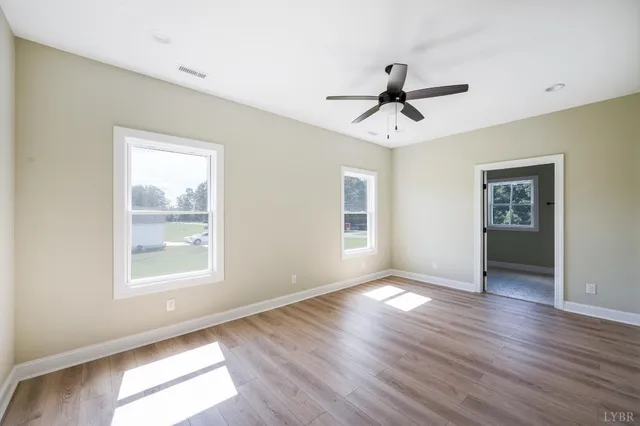 a close view of a sink a faucet and appliance in the kitchen