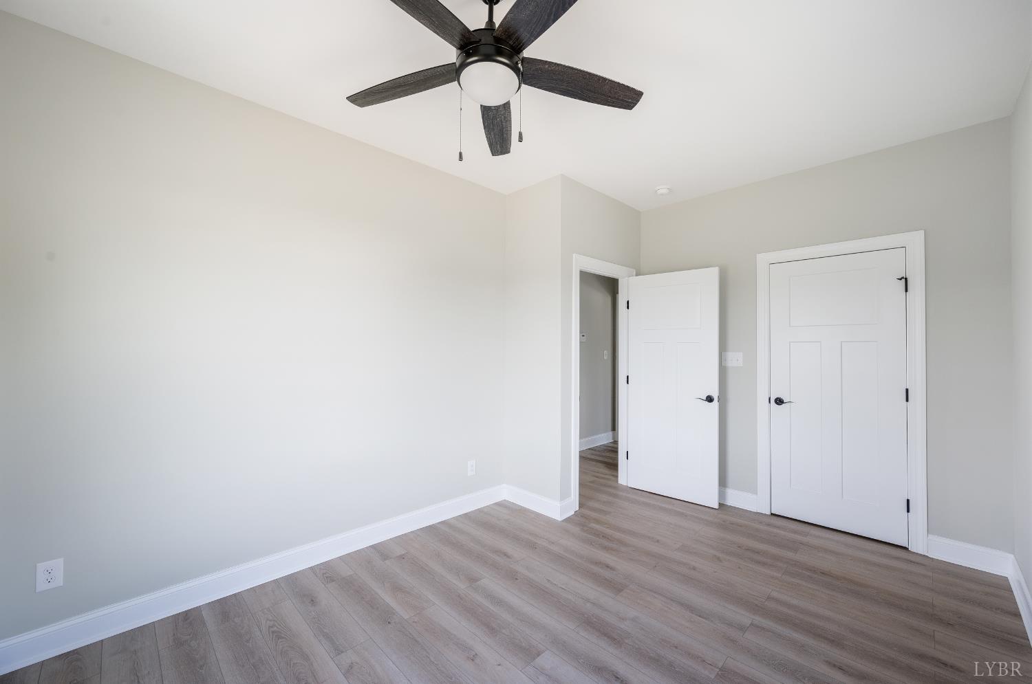 272 Marshall Mill Road Gladys, VA 24554 - Photo 67 of 71 a view of an empty room and wooden floor
