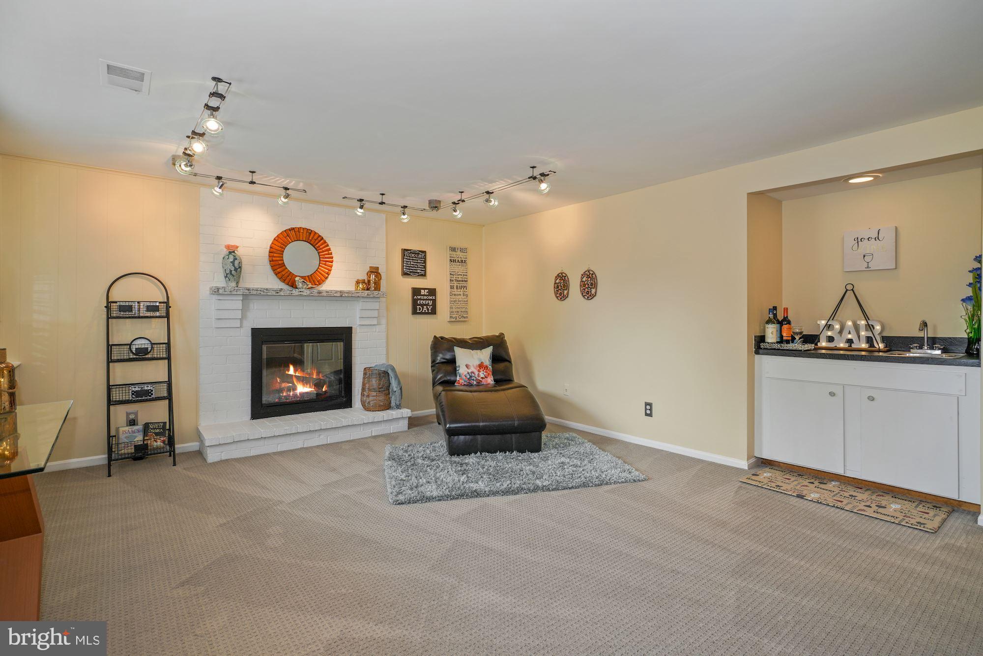 8112 Viola Street Springfield, VA 22152 - Photo 17 of 28 Recreation room with wet bar for entertaining