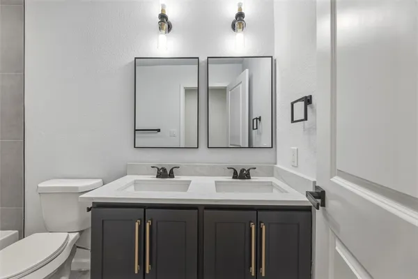 a bathroom with a sink and a toilet