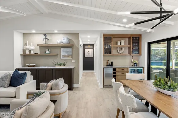 a kitchen with a table and chairs