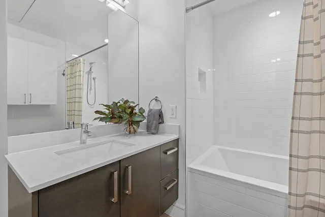 a bathroom with a sink and a bathtub