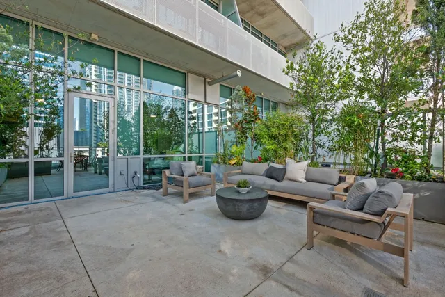 a outdoor living space with patio furniture and garden