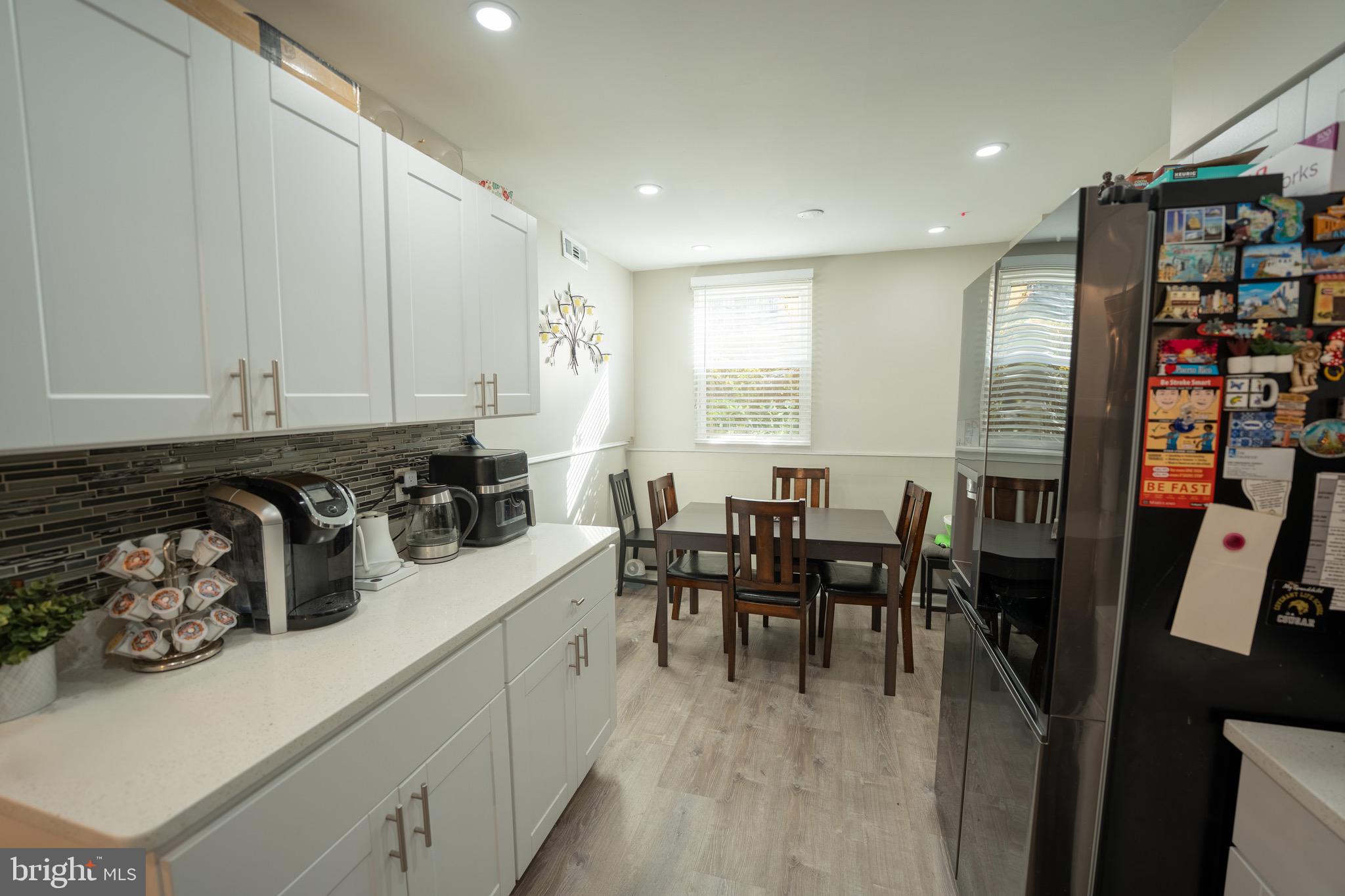 15 Pickering Court, Unit 1502 Germantown, MD 20874 - Photo 7 of 17 a kitchen with lots of counter top space