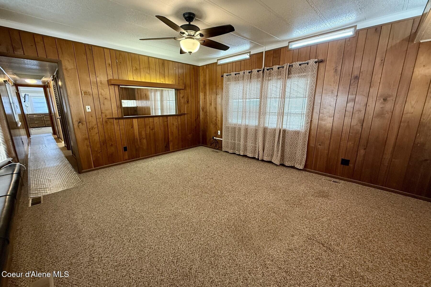8570 North Hayden Pines Way Hayden, ID 83835 - Photo 17 of 38 Living Room to Hallway