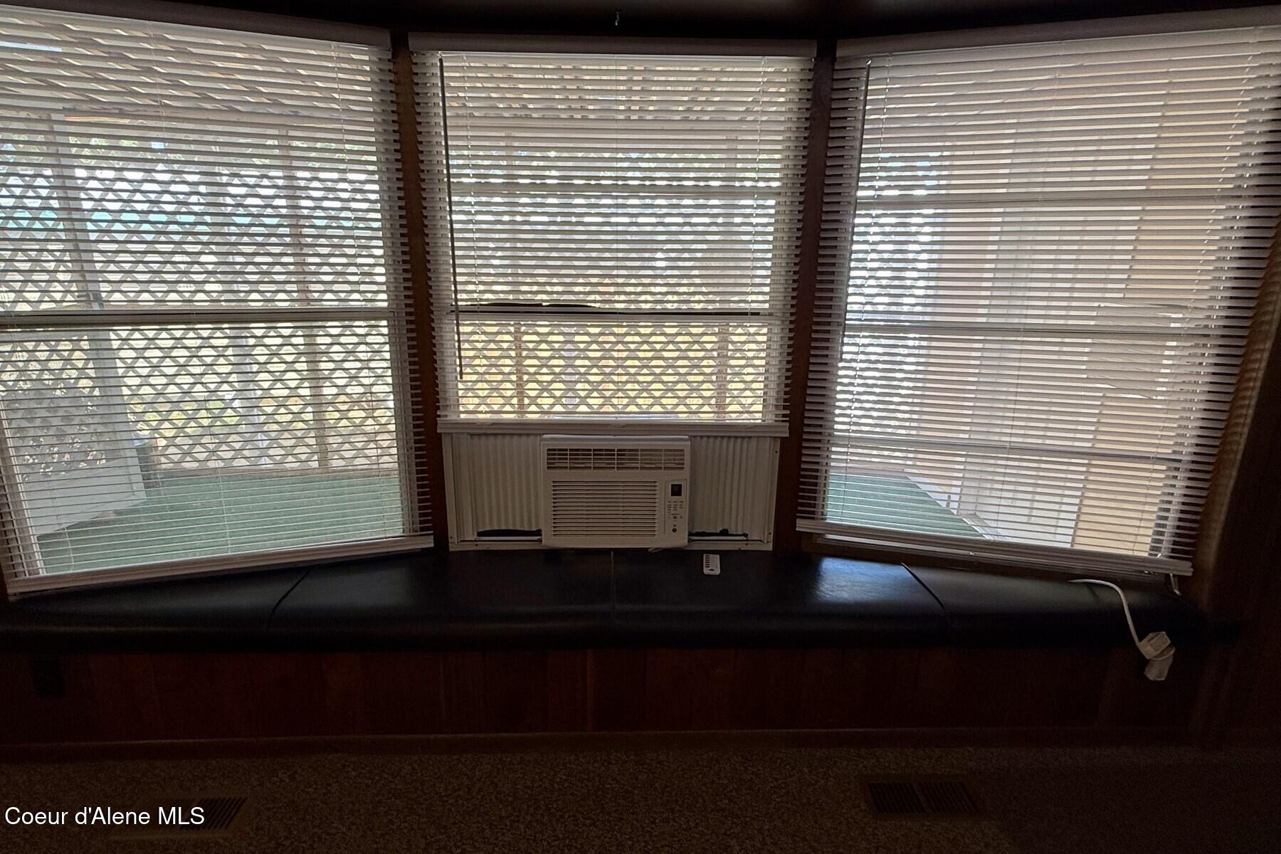 8570 North Hayden Pines Way Hayden, ID 83835 - Photo 19 of 38 Bay Window with Bench