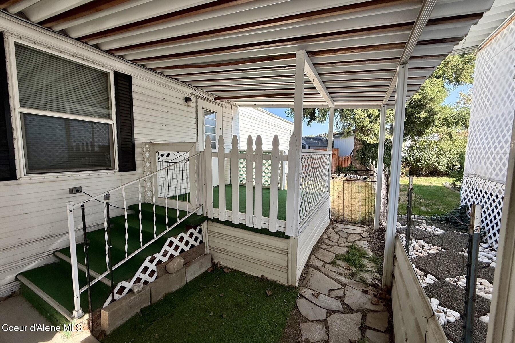 8570 North Hayden Pines Way Hayden, ID 83835 - Photo 33 of 38 Covered Back Deck