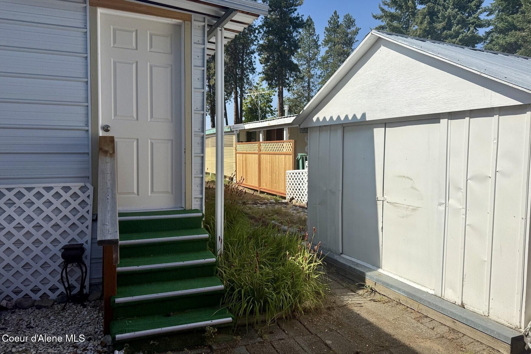 8570 North Hayden Pines Way Hayden, ID 83835 - Photo 35 of 38 Shed Behind Bonus RoomPorch