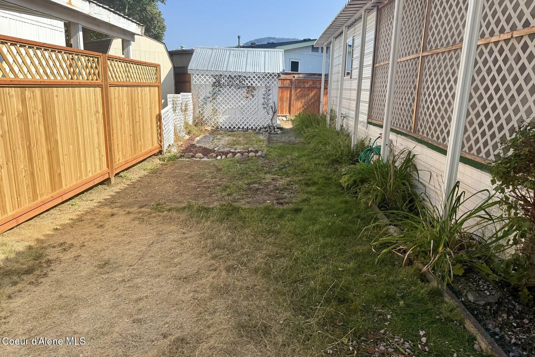 8570 North Hayden Pines Way Hayden, ID 83835 - Photo 36 of 38 Side Yard & Rock Garden