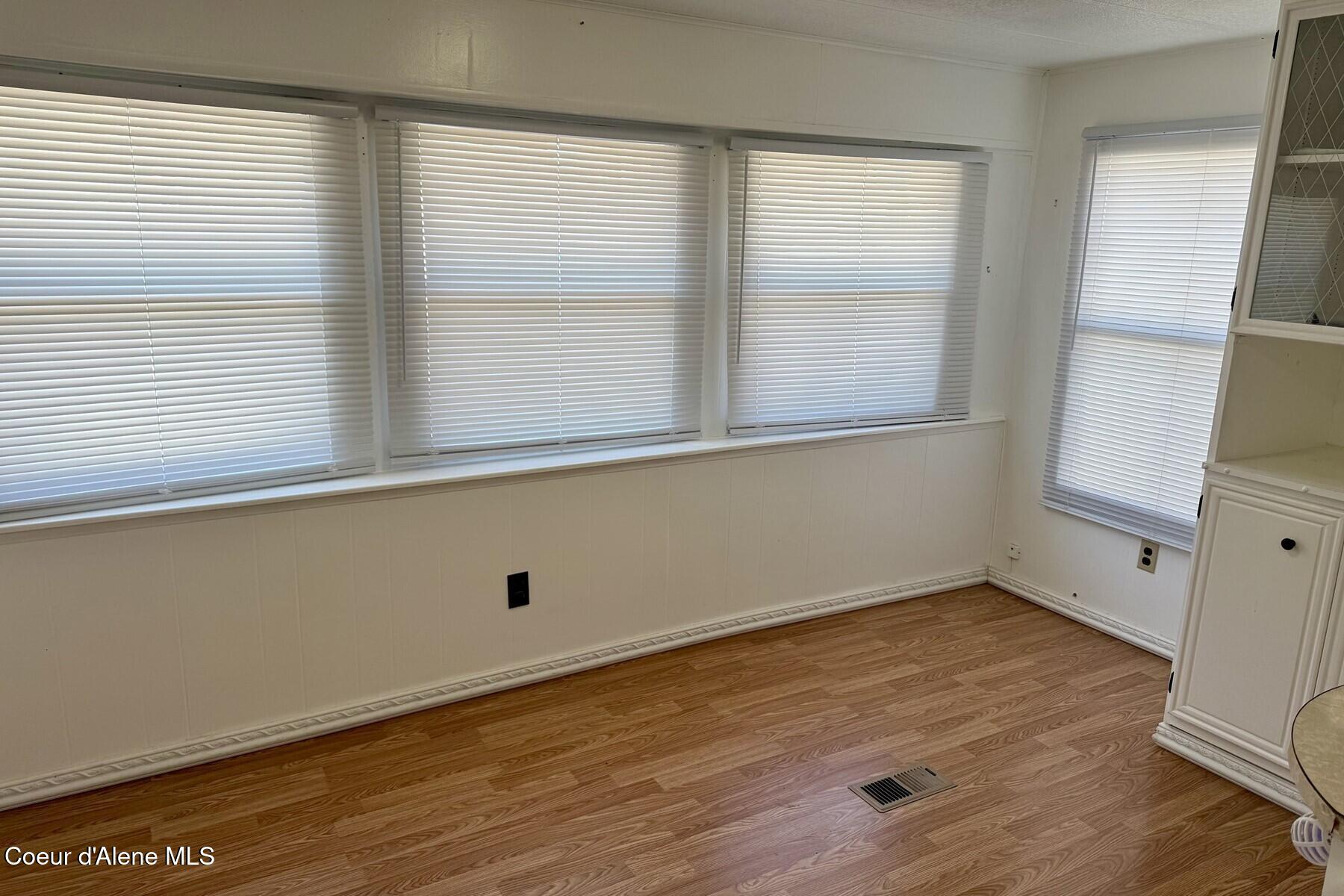 8570 North Hayden Pines Way Hayden, ID 83835 - Photo 7 of 38 Dining Wall of Windows