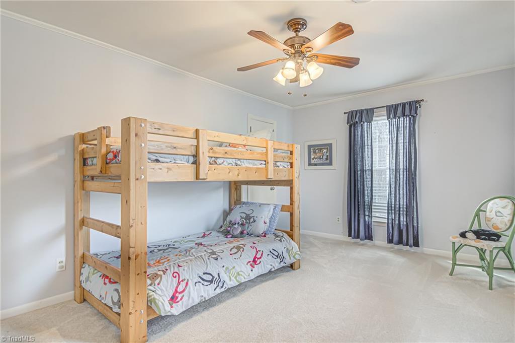 305 Pine Ridge Drive High Point, NC 27262 - Photo 23 of 35 Fourth bedroom also feature large windows and closet.