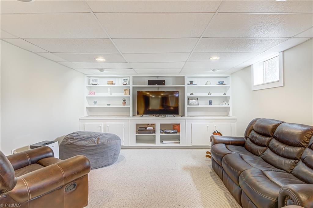 305 Pine Ridge Drive High Point, NC 27262 - Photo 27 of 35 This playroom also has built-in furniture and built-in shelving!