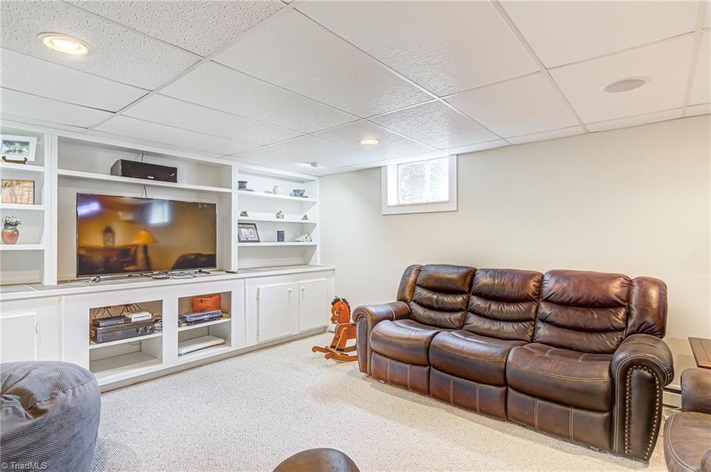 305 Pine Ridge Drive High Point, NC 27262 - Photo 28 of 35 Playroom will be a great place to relax.