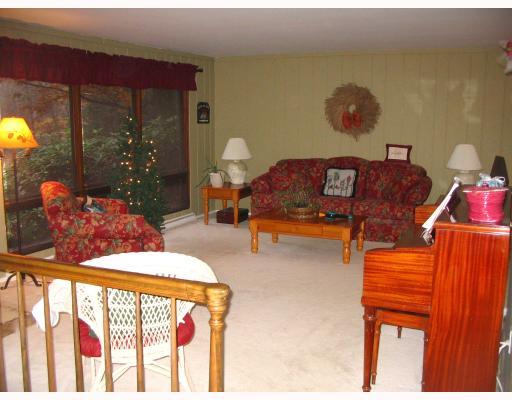 119 Valley Road Wexford, PA 15090 - Photo 2 of 8 Living Room. Features wall-to-wall carpet and large picture windows.
