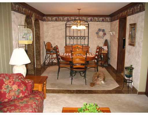 119 Valley Road Wexford, PA 15090 - Photo 3 of 8 Dining Room. Marble tile floor perimeter and arches to family room on left.