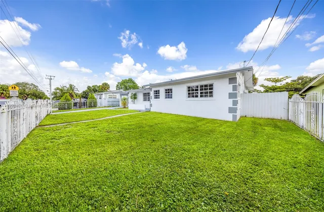 a view of a backyard with a garden