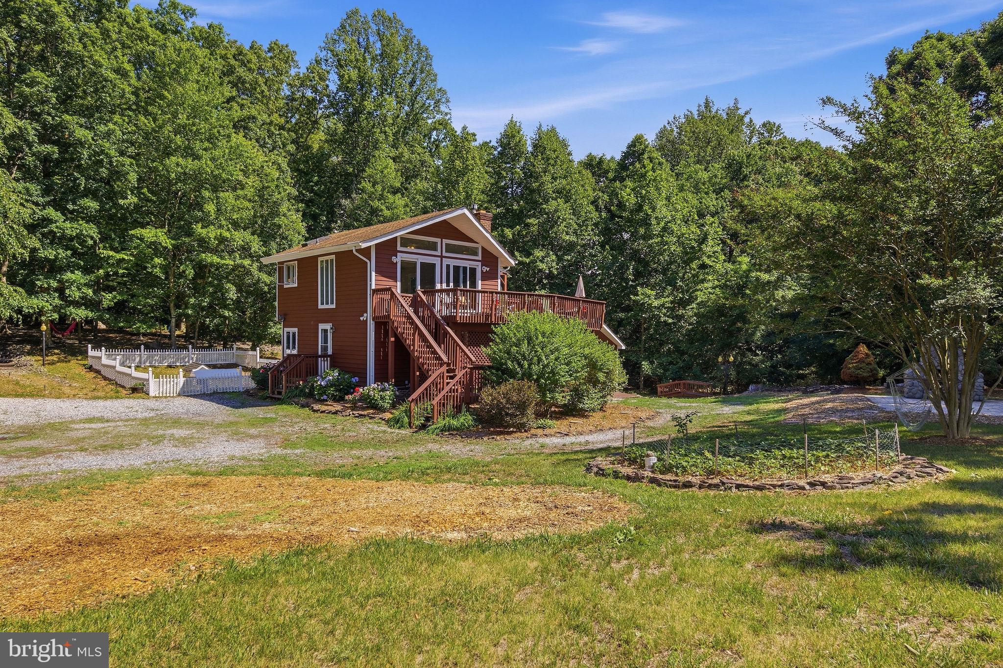 4150 Williams Wharf Road St. Leonard, MD 20685 - Photo 1 of 70 Charming home nestled in nature's embrace.