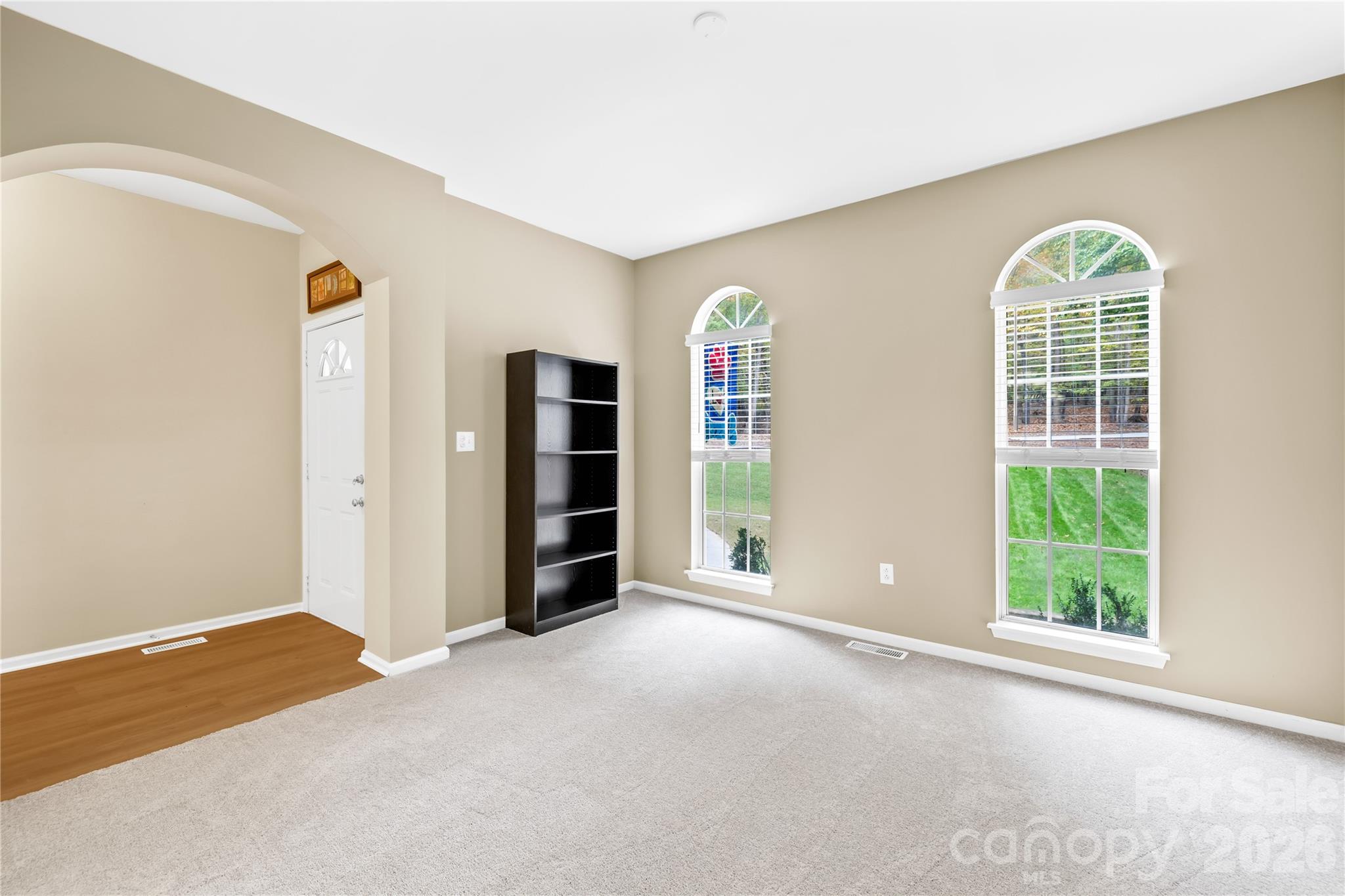 11113 Asbury Chapel Road Huntersville, NC 28078 - Photo 11 of 43 an empty room with windows and closet