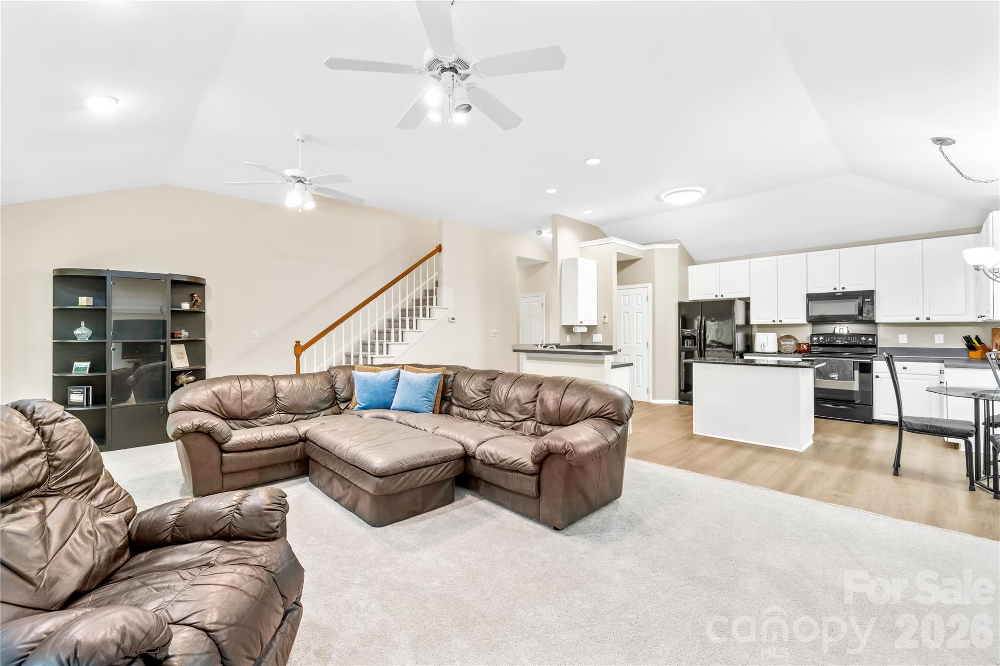 11113 Asbury Chapel Road Huntersville, NC 28078 - Photo 19 of 43 a living room with furniture and kitchen view