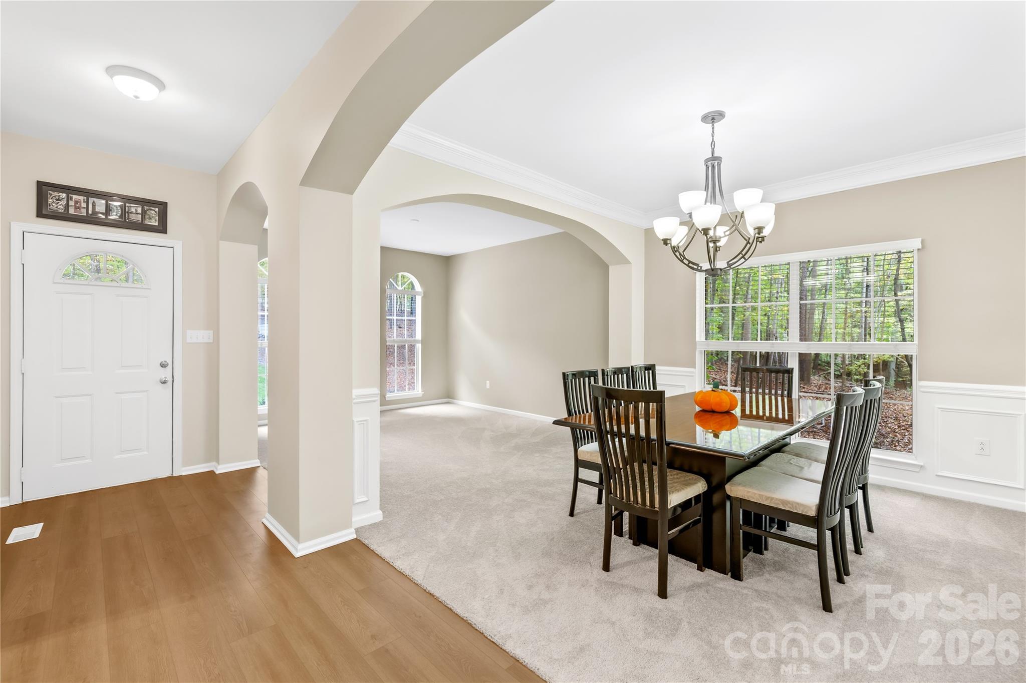 11113 Asbury Chapel Road Huntersville, NC 28078 - Photo 9 of 43 a view of a dining room with furniture and window