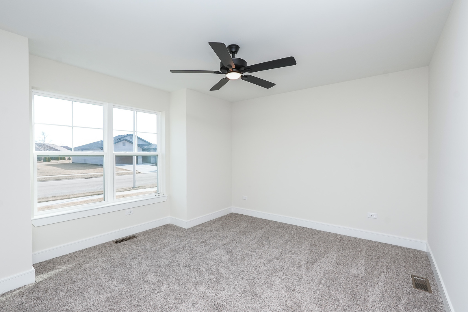 1009 Spring Street Manteno, IL 60950 - Photo 11 of 36 an empty room with a window