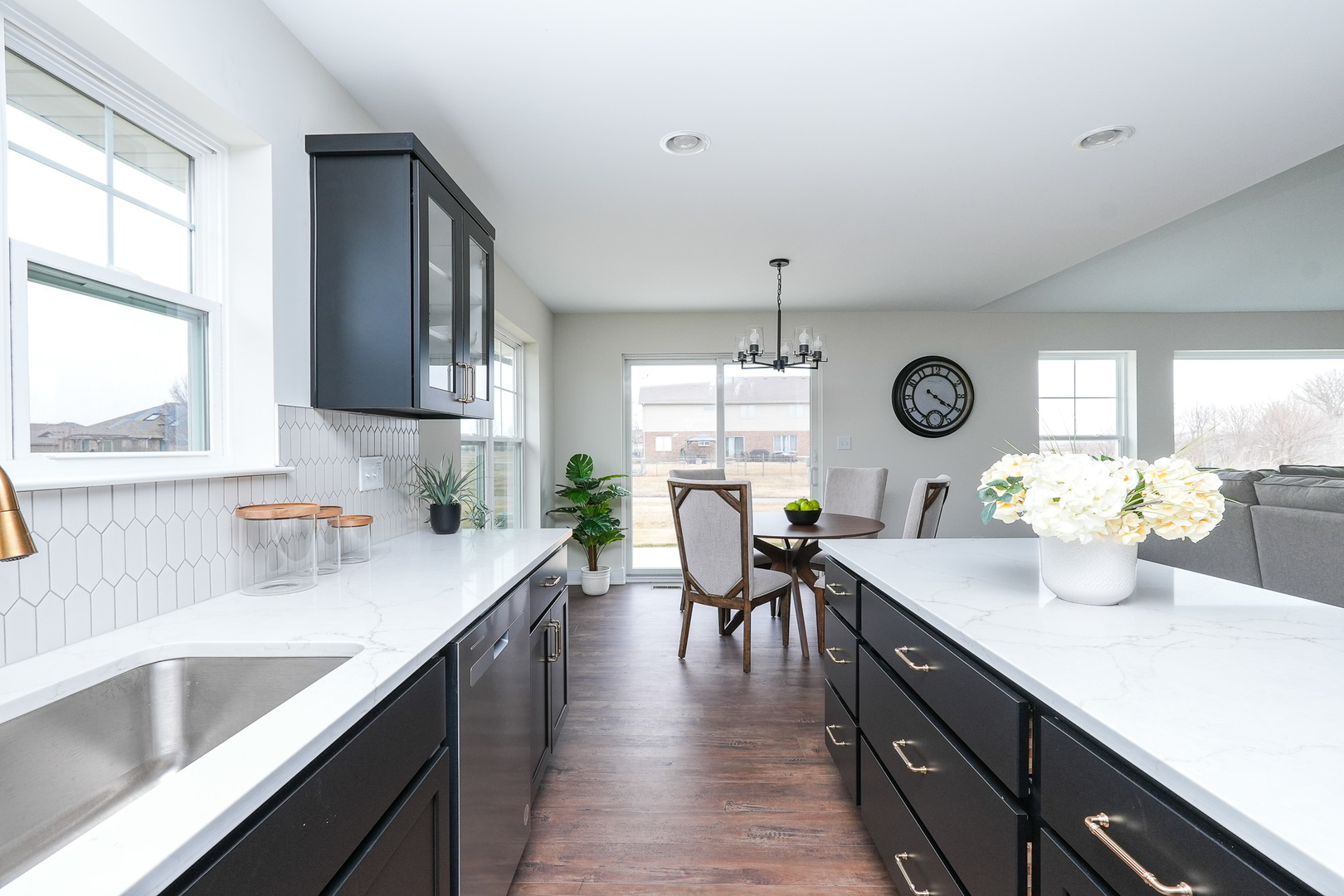 1009 Spring Street Manteno, IL 60950 - Photo 17 of 36 a kitchen with a sink cabinets and window
