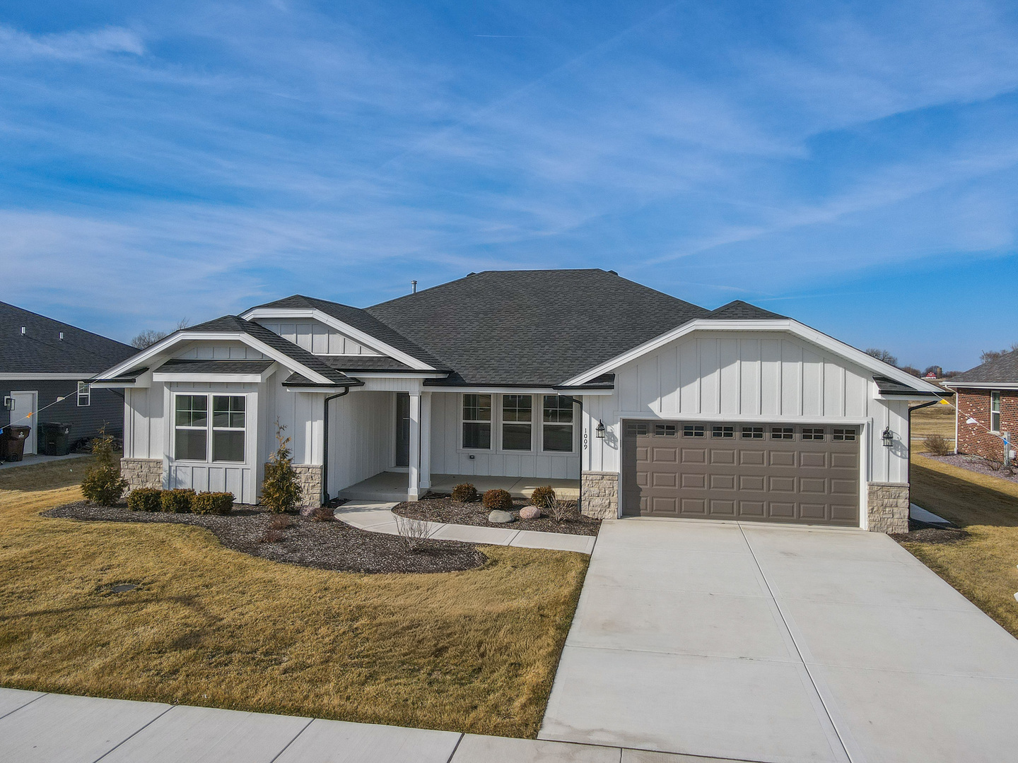 1009 Spring Street Manteno, IL 60950 - Photo 2 of 36 a front view of a house with yard