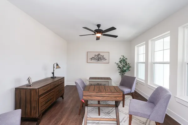 a workspace with furniture and window