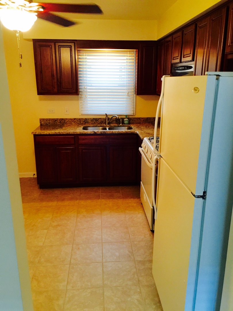 2290 182nd Place Lansing, IL 60438 - Photo 5 of 16 a view of walk in closet with window