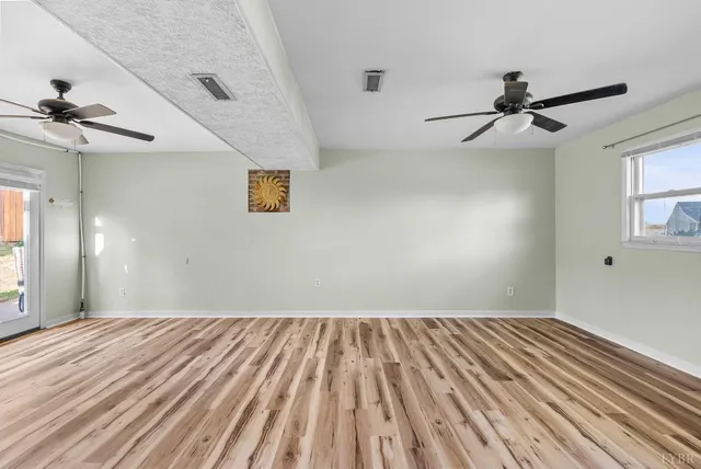 wooden floor in a hall with an entryway