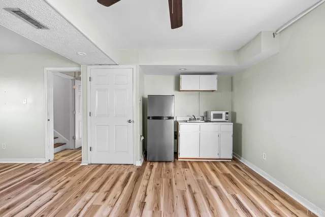 a view of kitchen and utility room