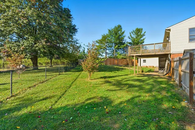 a view of a backyard with a garden
