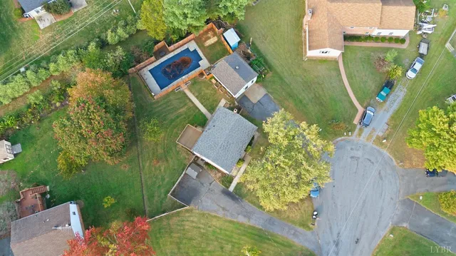 an aerial view of residential house with outdoor space