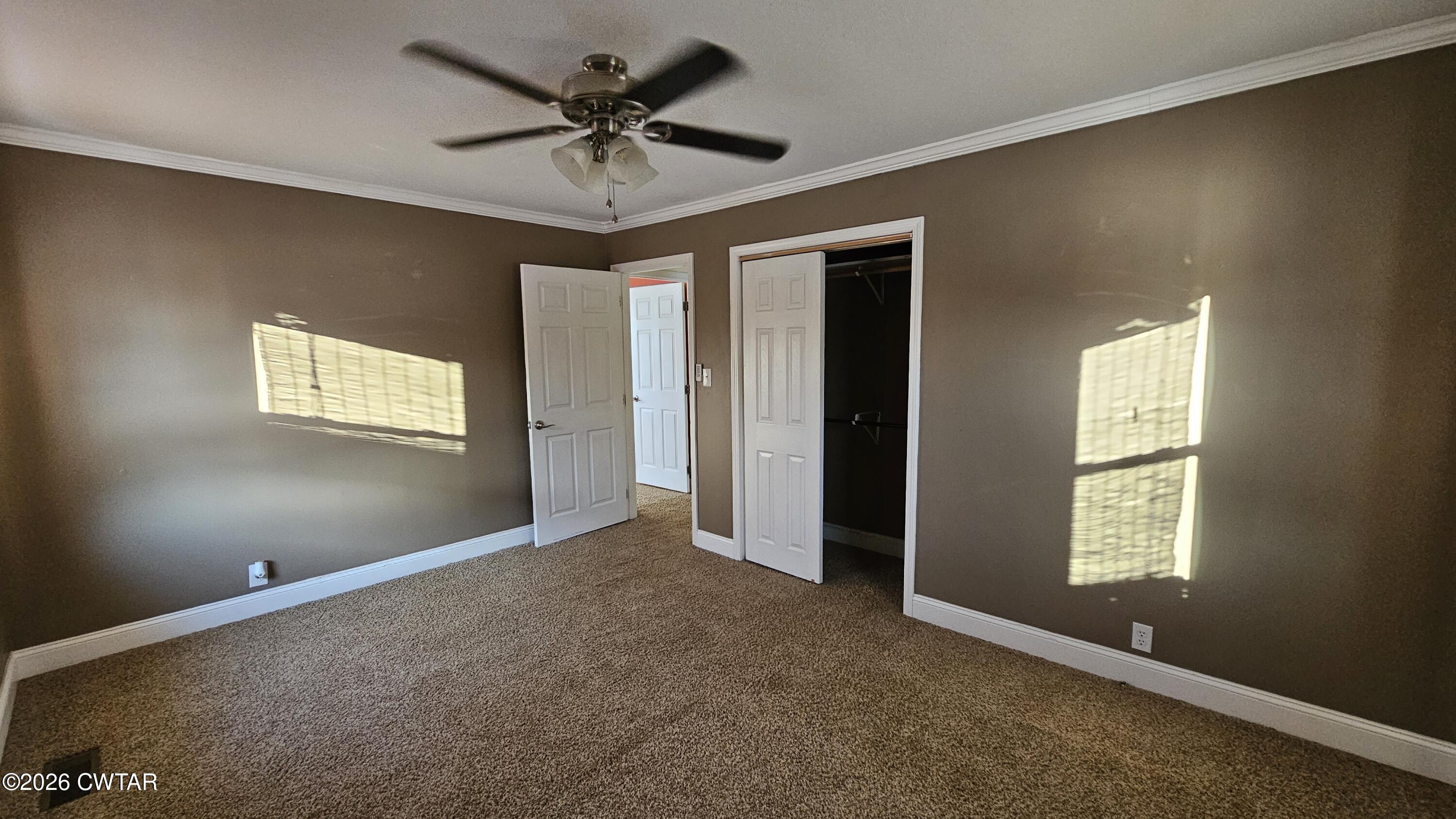 516 West Knox Street Rutherford, TN 38369 - Photo 13 of 19 an empty room with windows and fan