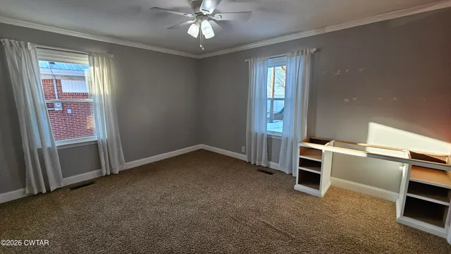 wooden floor and windows in a room