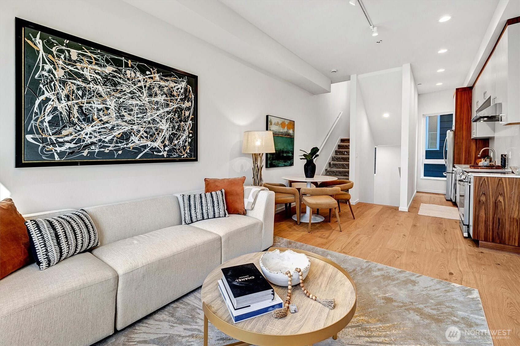 1227 East Roy Street Seattle, WA 98102 - Photo 11 of 35 a living room with furniture and a couch