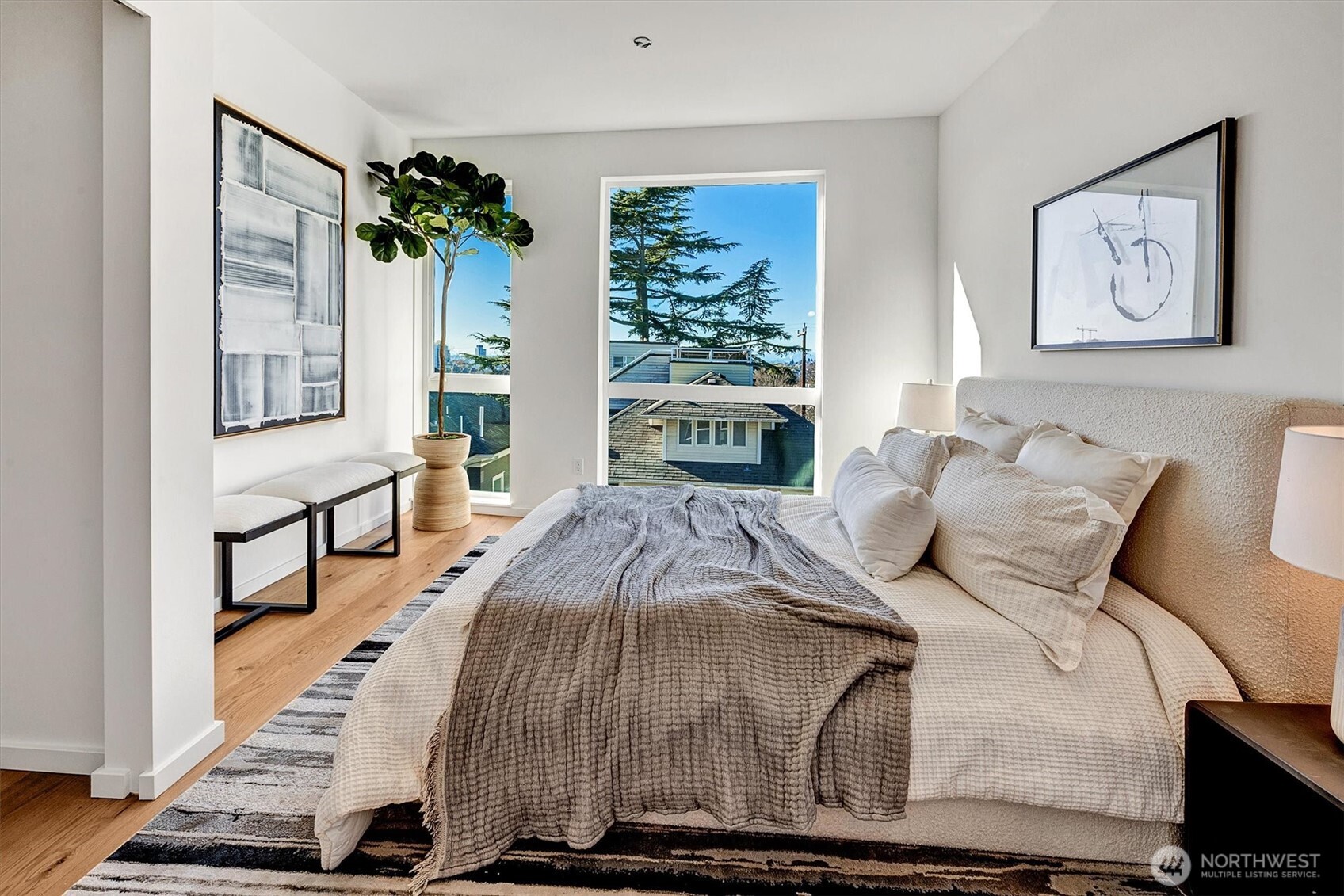 1227 East Roy Street Seattle, WA 98102 - Photo 18 of 35 a bedroom with bed and a window