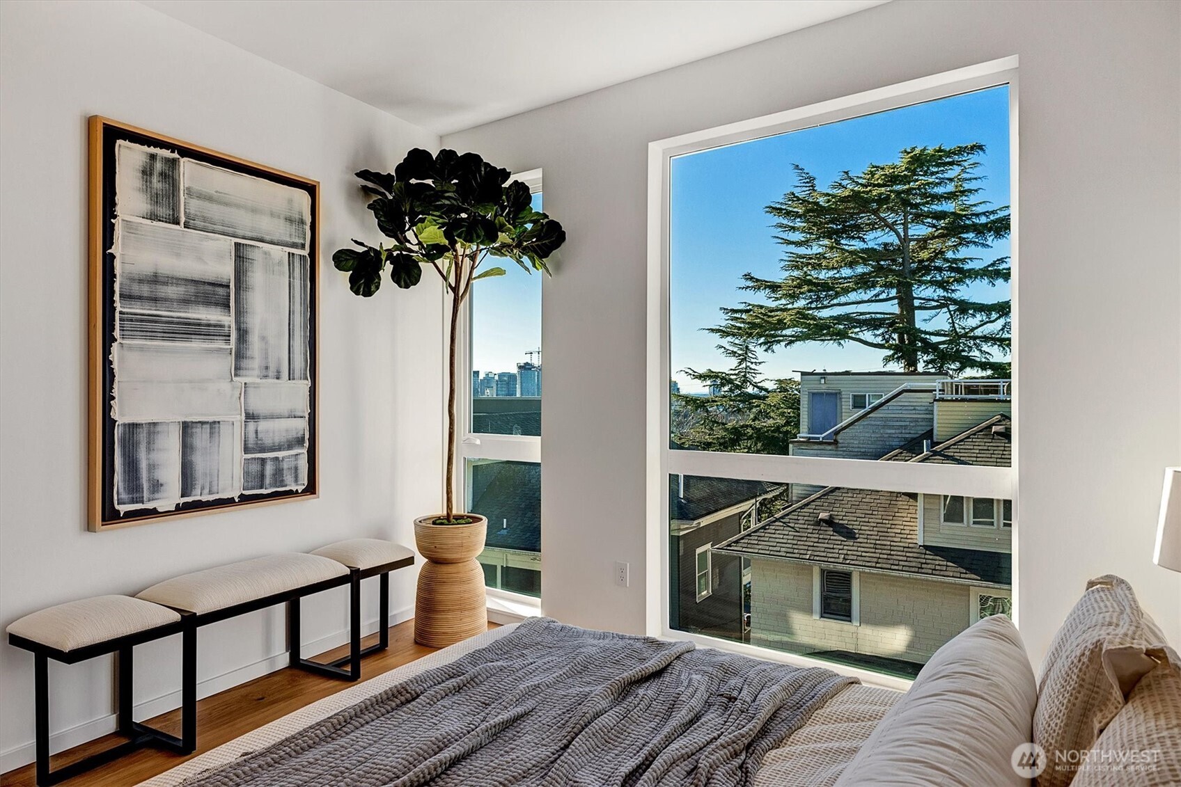 1227 East Roy Street Seattle, WA 98102 - Photo 21 of 35 a bedroom with a bed and a window