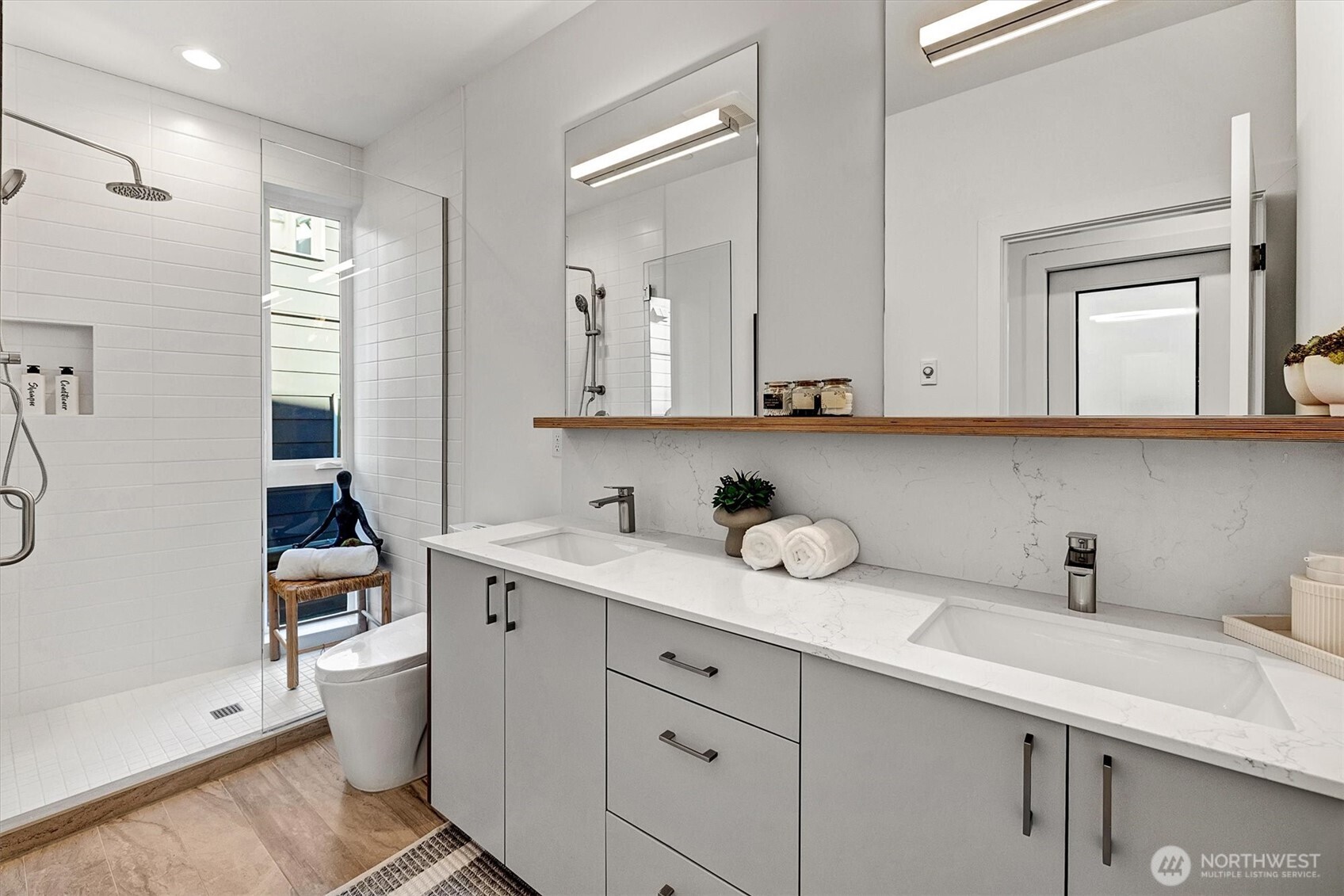 1227 East Roy Street Seattle, WA 98102 - Photo 23 of 35 a kitchen with a sink dishwasher and cabinets