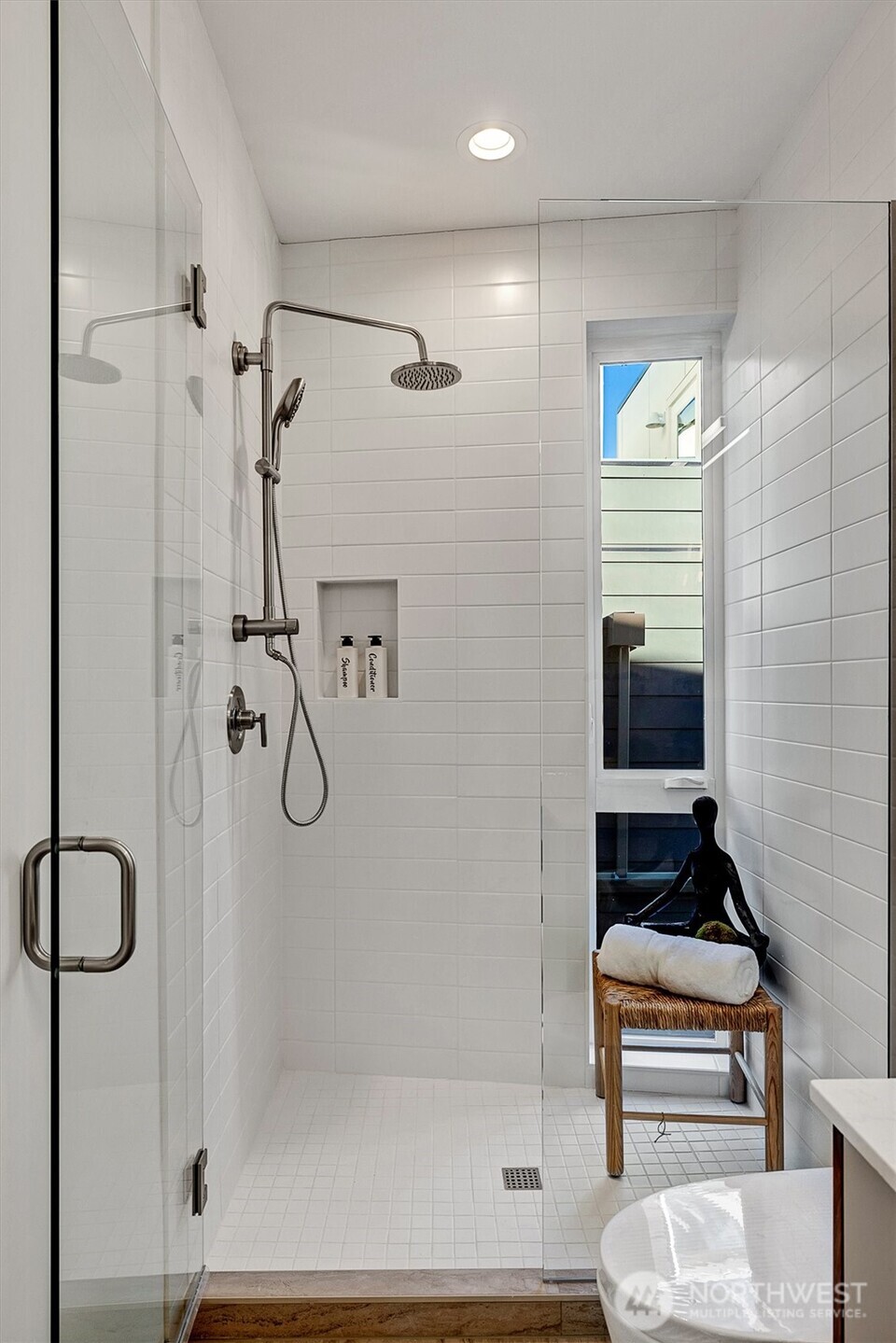 1227 East Roy Street Seattle, WA 98102 - Photo 24 of 35 a bathroom with a shower