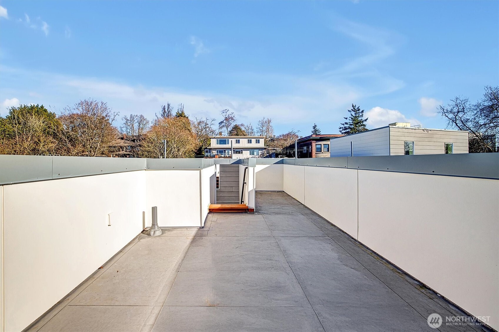 1227 East Roy Street Seattle, WA 98102 - Photo 26 of 35 a view of a terrace with skyline