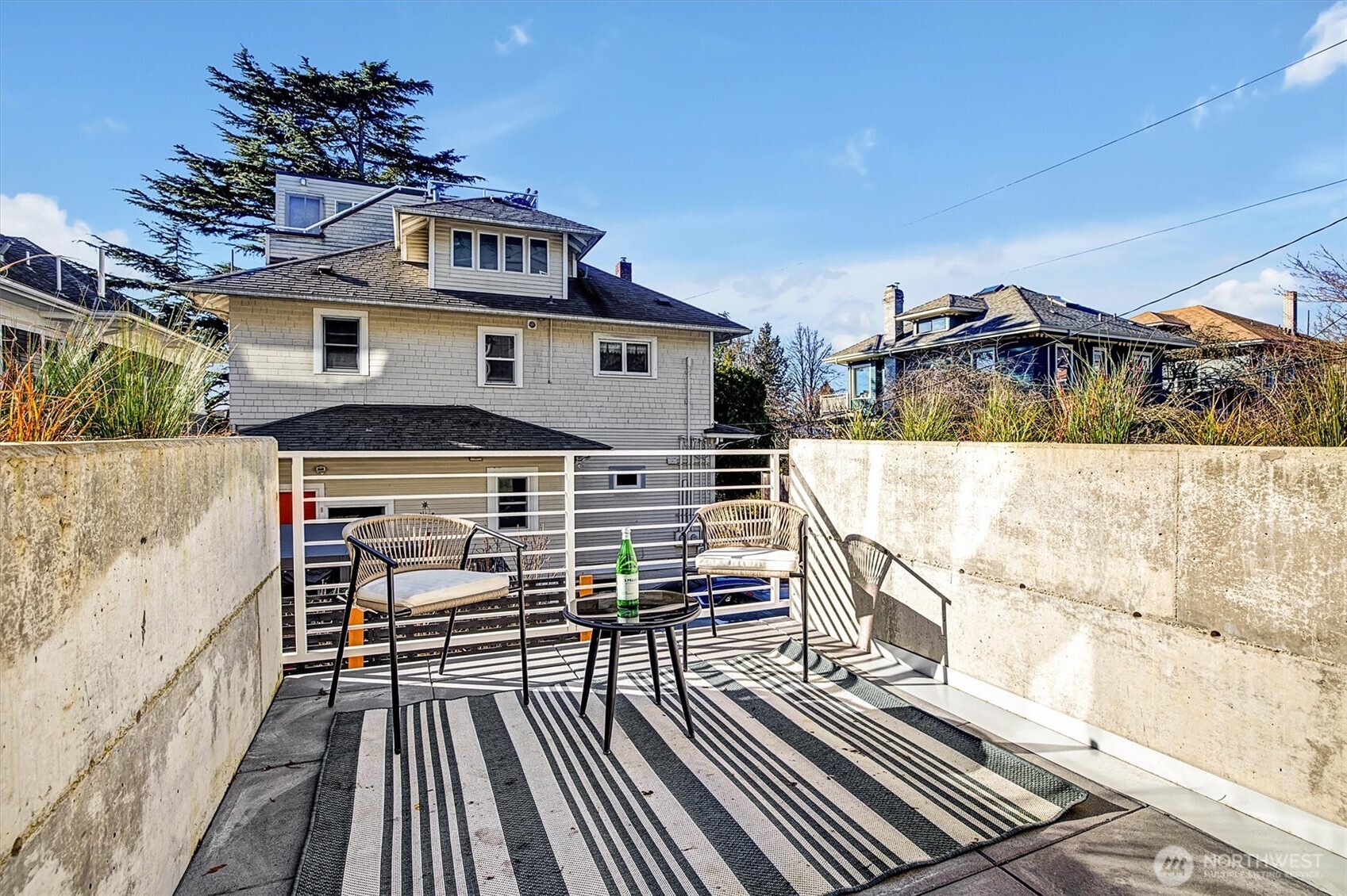 1227 East Roy Street Seattle, WA 98102 - Photo 5 of 35 a front view of a house with a balcony