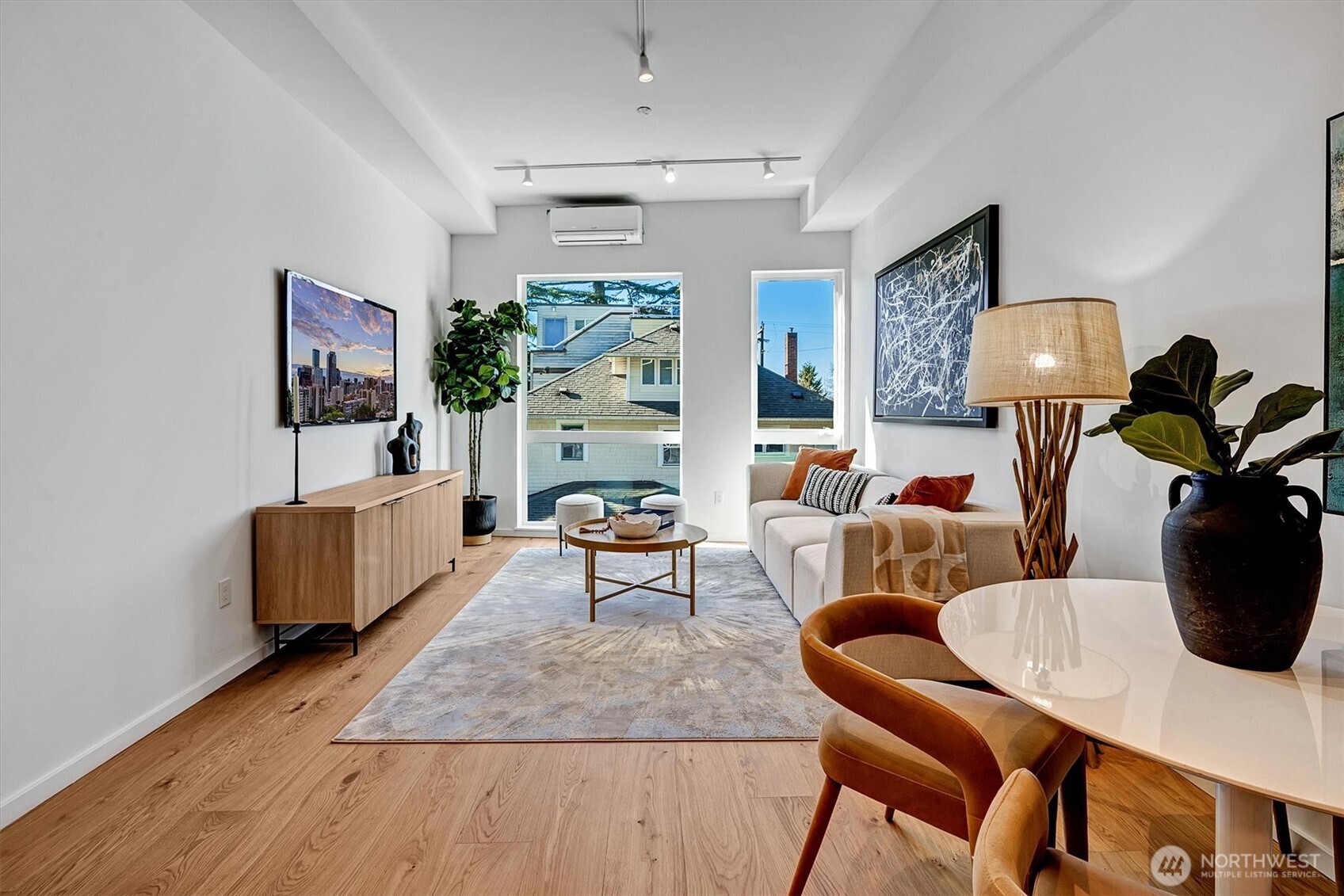 1227 East Roy Street Seattle, WA 98102 - Photo 7 of 35 a living room with furniture and a lamp
