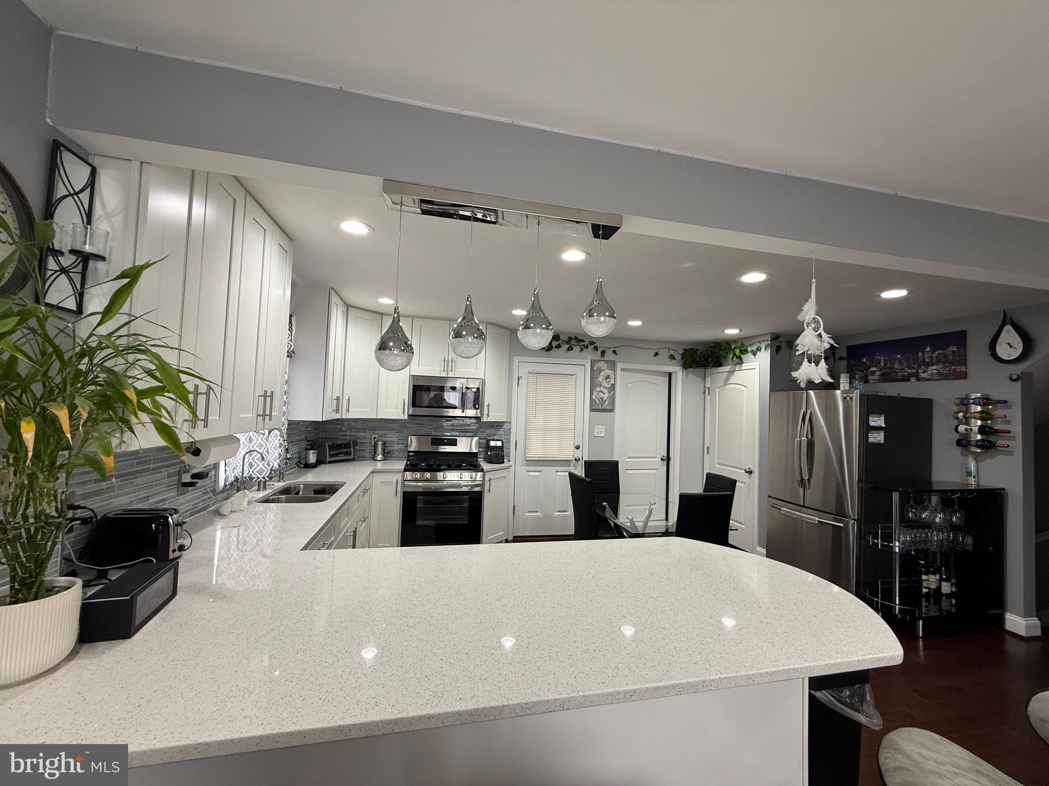 3499 Hillsmere Road Baltimore, MD 21207 - Photo 11 of 50 Modern kitchen with sleek finishes and style.