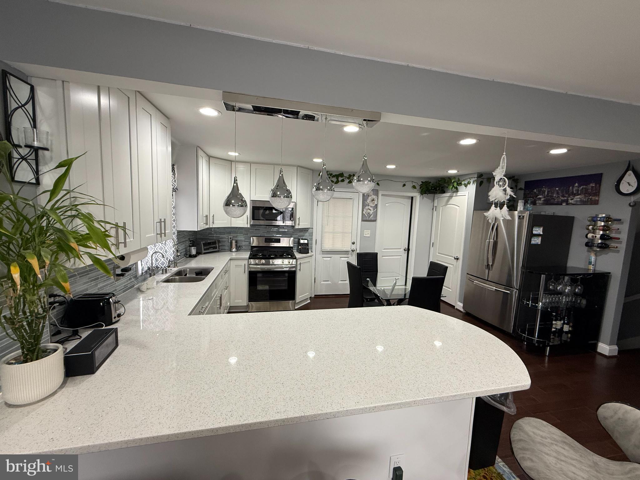 3499 Hillsmere Road Baltimore, MD 21207 - Photo 13 of 50 Modern kitchen with sleek finishes.