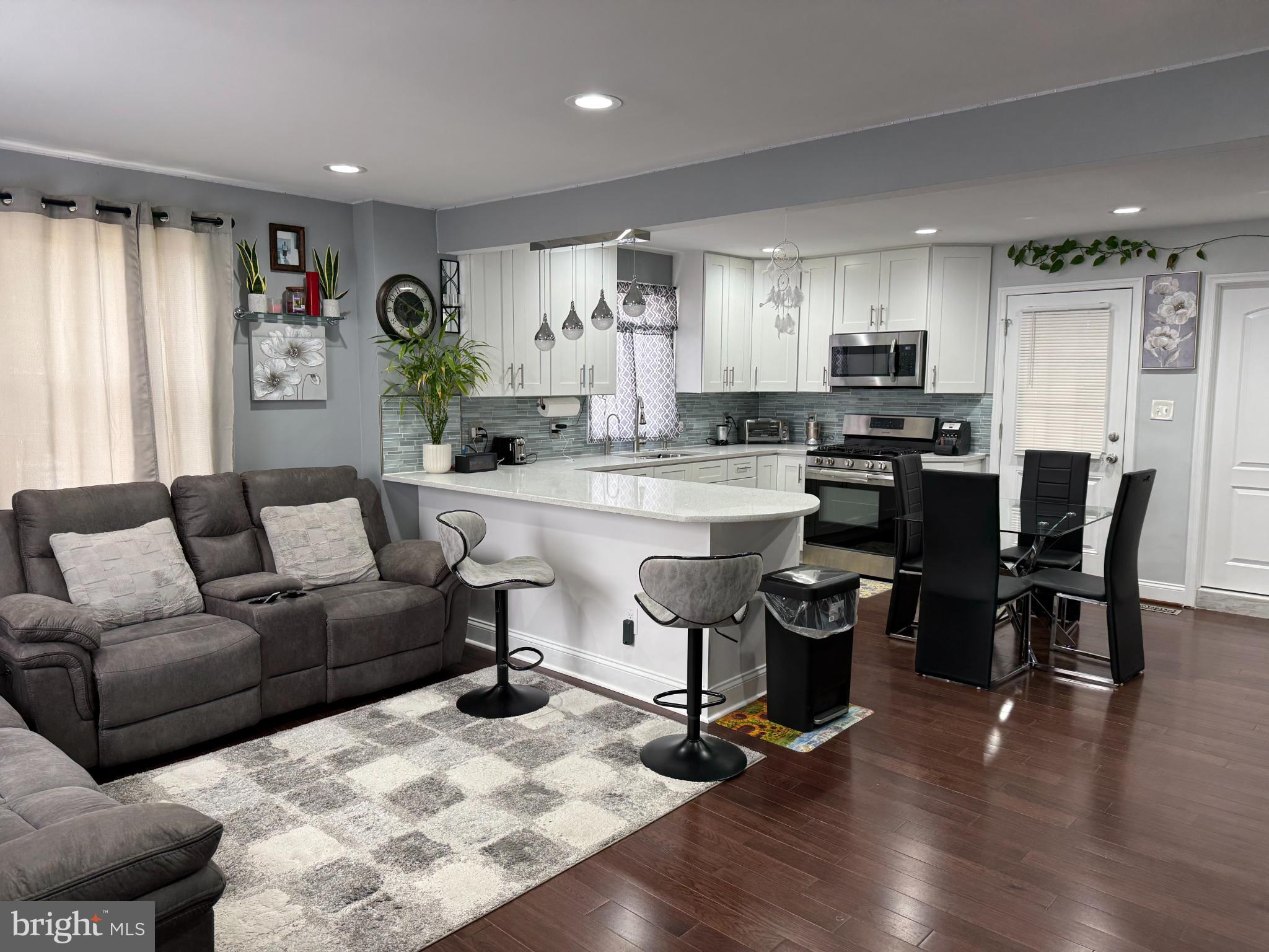 3499 Hillsmere Road Baltimore, MD 21207 - Photo 14 of 50 Modern open-concept living space with style.